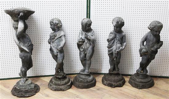 A set of four lead garden statues & one other